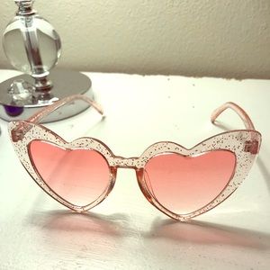 Pink heart shaped sunglasses